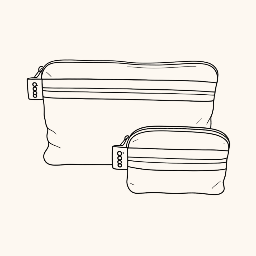 A silver foil zippered pouch  pocket with two horizontal stripes, one hot pink and one orange, on a light grey background.  Used to organise your everyday bag.
